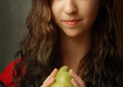 Piper Hayes portrait with green pear