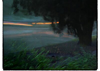 Rain and wind with passing car